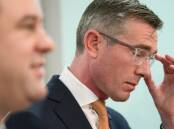 NSW Premier Dominic Perrottet, right, has some tough decisions to make around the future of his Trade Minister Stuart Ayres. Picture: AAP