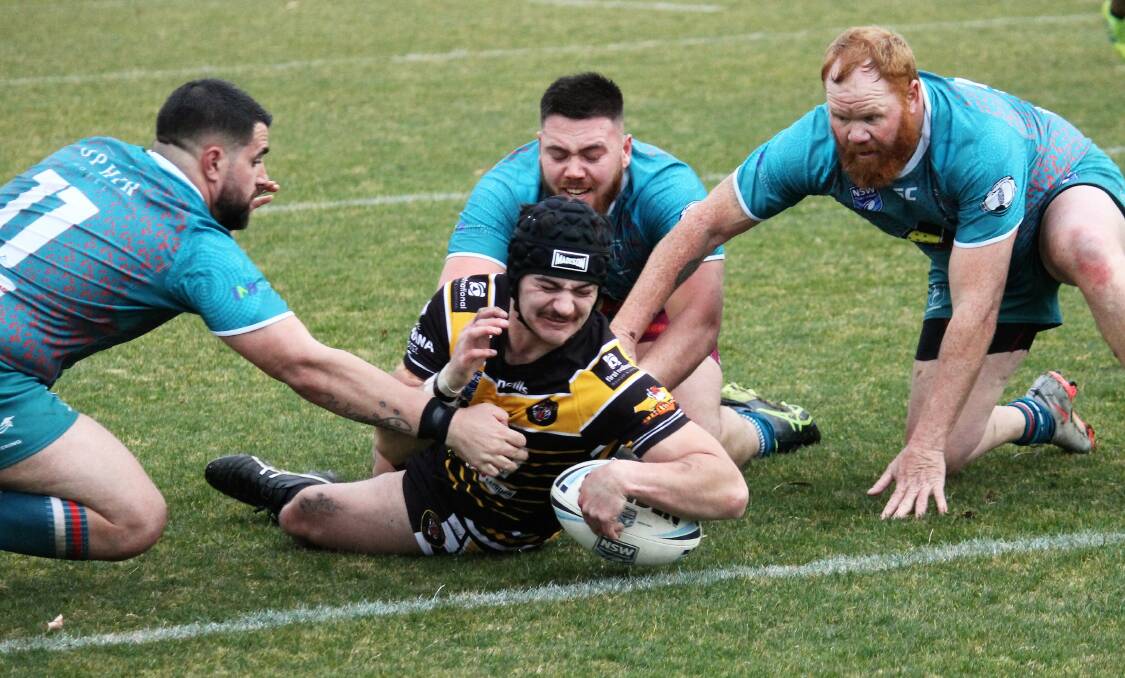 SPECIAL DELIVERY: Oberon hooker Caylib Marston scored a double for the Tigers as they won in their Woodbrigde Cup debut.