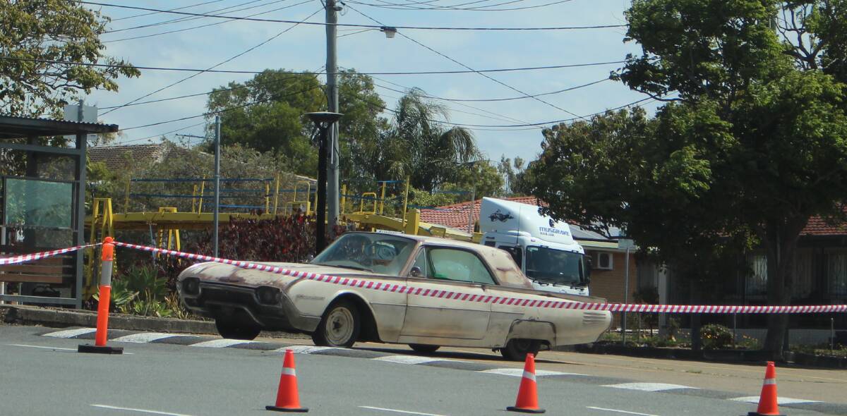 WHEELS: Vintage cars were brought onto the Capalaba set about 1pm. Photo: Jordan Crick