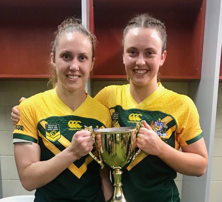 LEADING THE WAY: Prime Minister's XIII skipper Karina Brown and Orange's Kaitlyn Phillips after their win in Fiji. Phillips says Brown's leadership was invaluable throughout the week on tour. Photo: CONTRIBUTED 