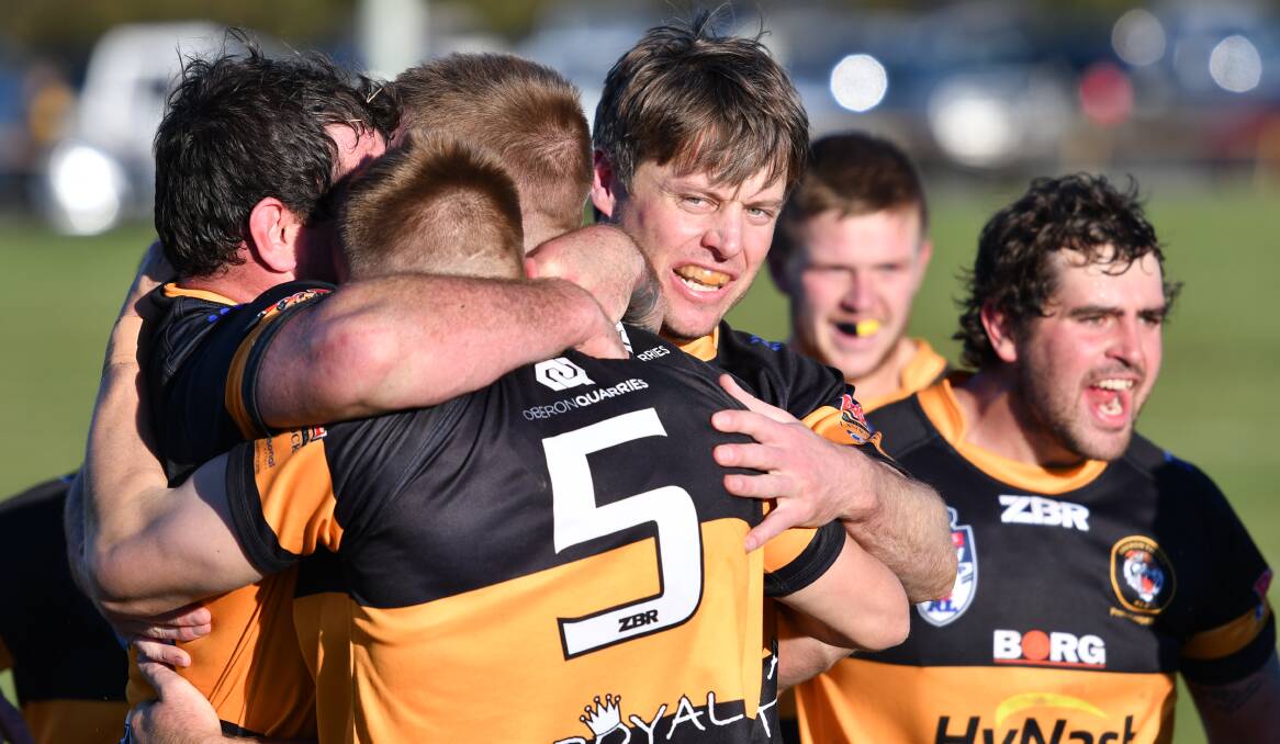 FINDING FORM: The Tigers celebrate a try last week against Panthers, Oberon hosts Hawks on Sunday. Photo: ALEX GRANT