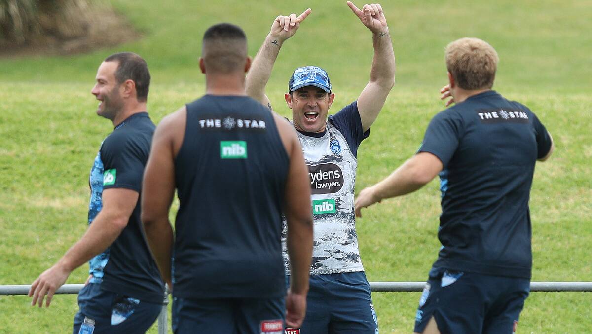 READY TO GO: NSW coach Brad Fittler laps up Blues training. Photo: NSWRL