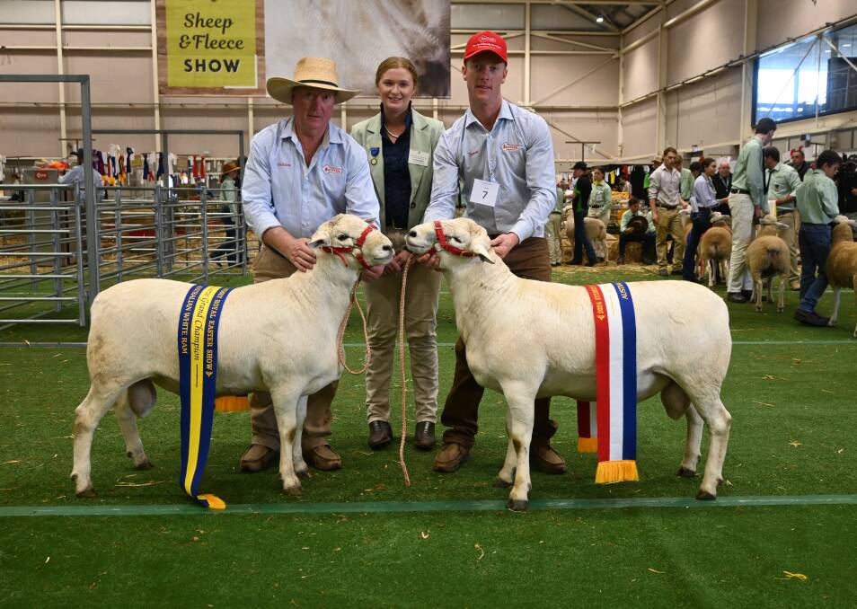 Tattykeel's Graham Gilmore with the reserve champion ram, judge Jo Balcombe, Young, and Tattykeel's James Gilmore with the grand champion ram. Picture by Denis Howard