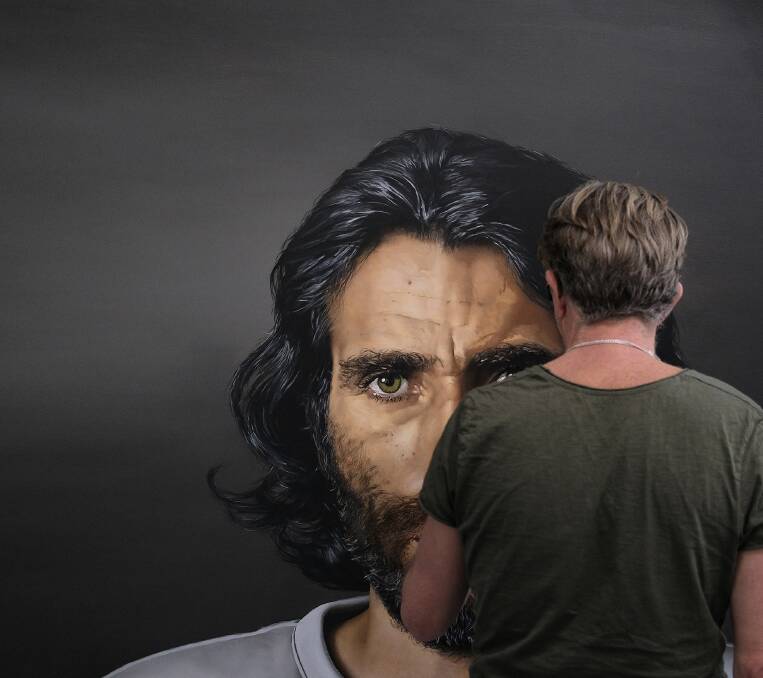 Angus paints Behrouz Boochani for The Archibald, 2020. 