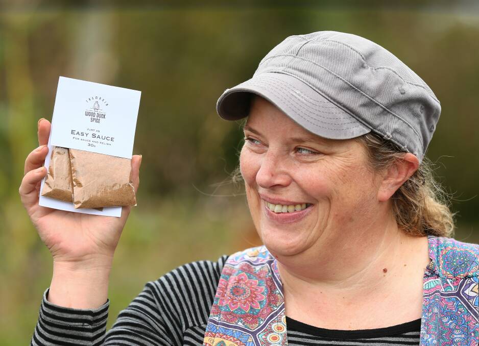 Too Easy: Latrobe spice entrepreneur Melanie Clarke with her popular Just As Easy Sauce blend that's taken off since the demise of Ezy Sauce. Picture: Rodney Braithwaite.