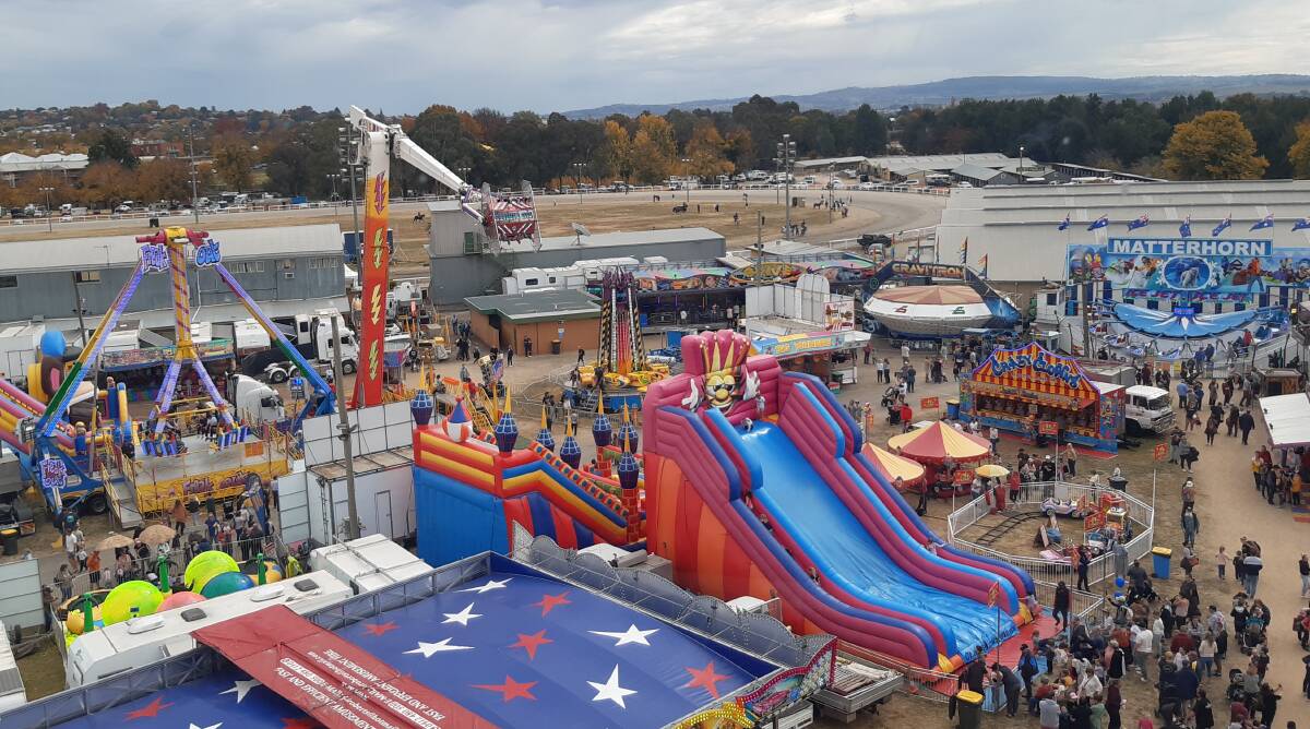 WHAT A SIGHT: A bird's eye view of Royal Bathurst Show from the top of the ferris wheel, with Mount Rankin in the background.