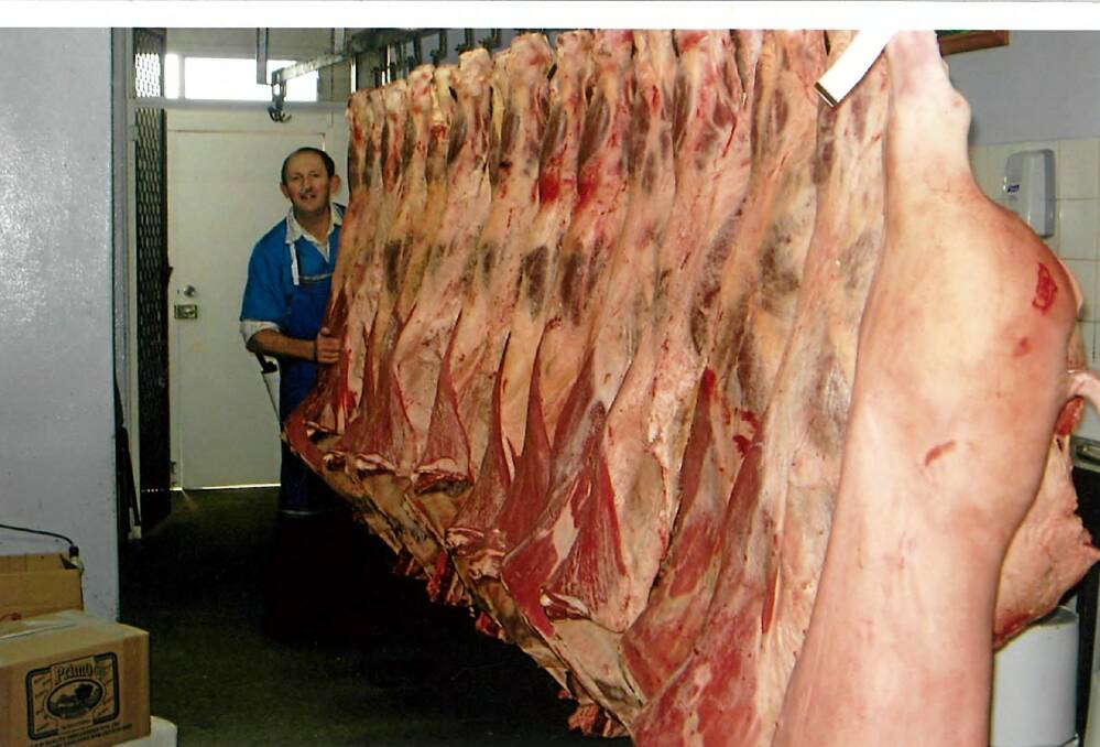 LINE THEM UP: "This is what it is all about," Wayne Barker said of this photo. The butcher notched up forty years of serving the best cuts to the people of Oberon.