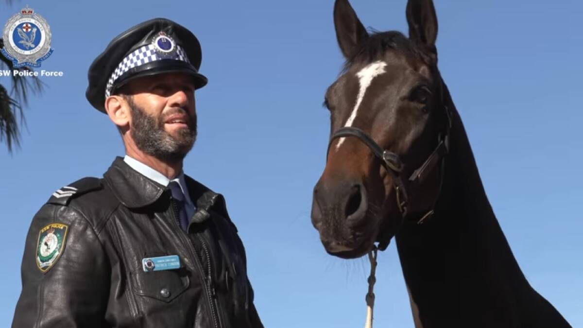 GREAT MATES: Senior Constable Patrick Condon with his NSW Police Mounted Unit horse Tobruk. Image: NSW Police