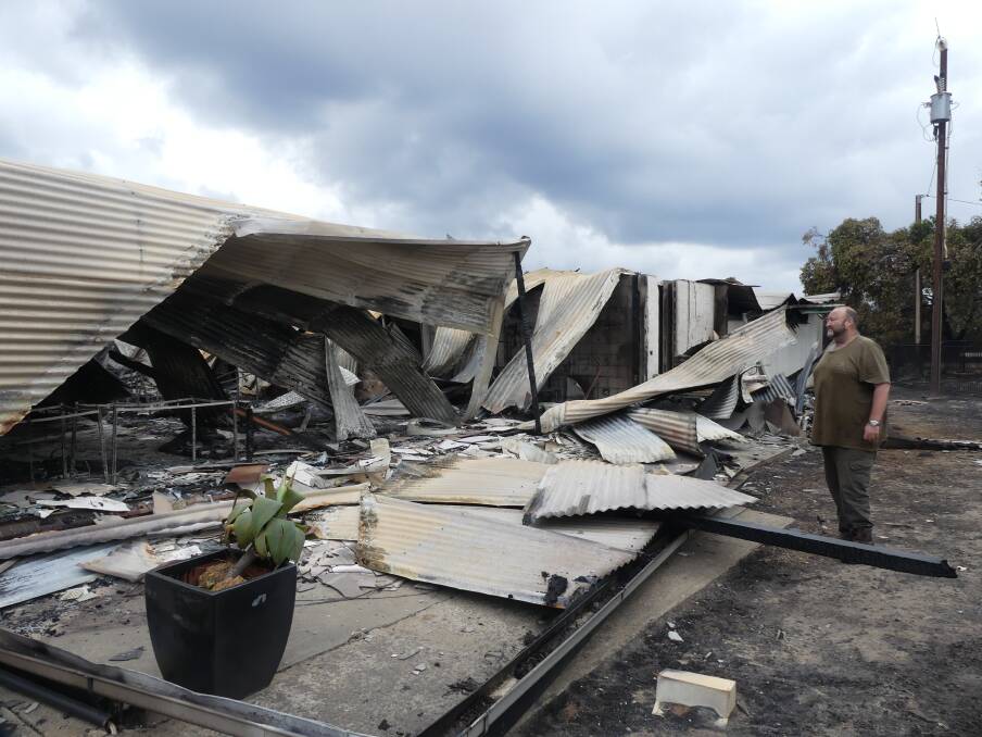 Western Districts Football Club president Tony Nolan surveys the damage caused by the Kangaroo Island fire on Saturday afternoon and remained stoic. 