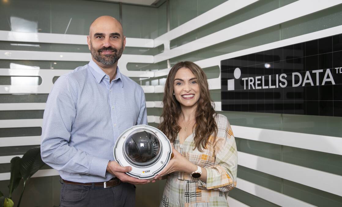 Trellis Data product manager James Meszes and co-founder Rachel Gately with the new camera that's been developed to detect invasive species coming from overseas. Picture: Keegan Carroll