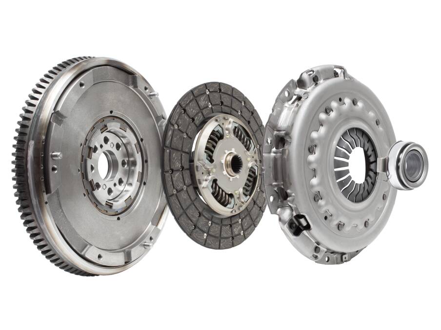 The flywheel, clutch friction plate, clutch pressure plate, and thrust bearing. Photo: Shutterstock.