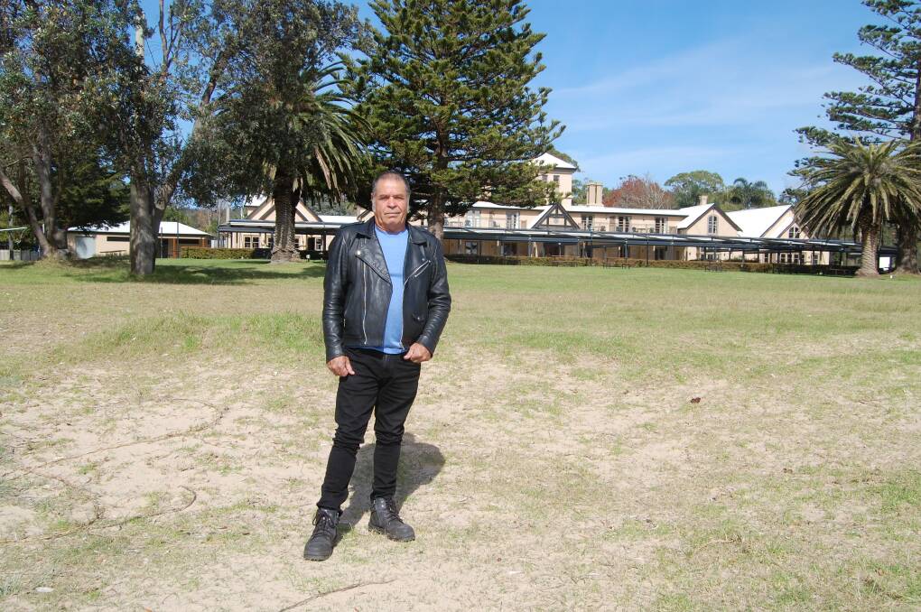 Uncle BJ Cruse with the The Seahorse Inn behind him at Boydtown, which is reportedly to be renamed. Photo: Leah Szanto