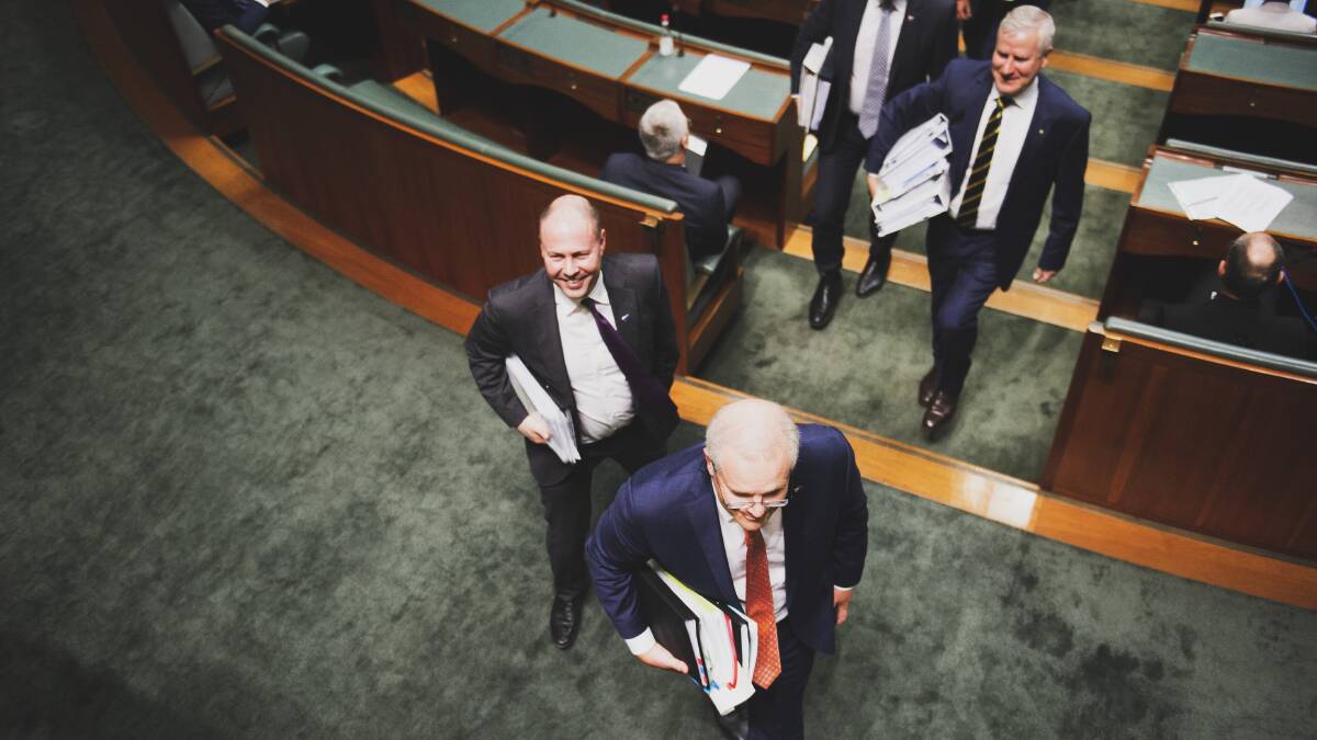 Treasurer Josh Frydenberg and Prime Minister Scott Morrison leave Question Time on Thursday. Picture: Dion Georgopoulos