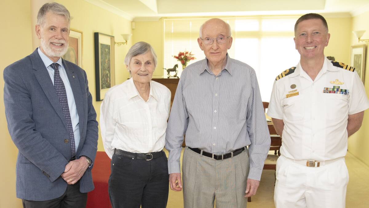 HMAS Sydney's II Unknown Sailor relative, Dr Leigh Lehane with her husband Robert Lehane (centre). Naval Historian Mr John Perryman of the Sea Power Centre (Left) and Naval Researcher, Commander Greg Swinden, RAN (right) stand on the flanks. Picture: Department of Defence