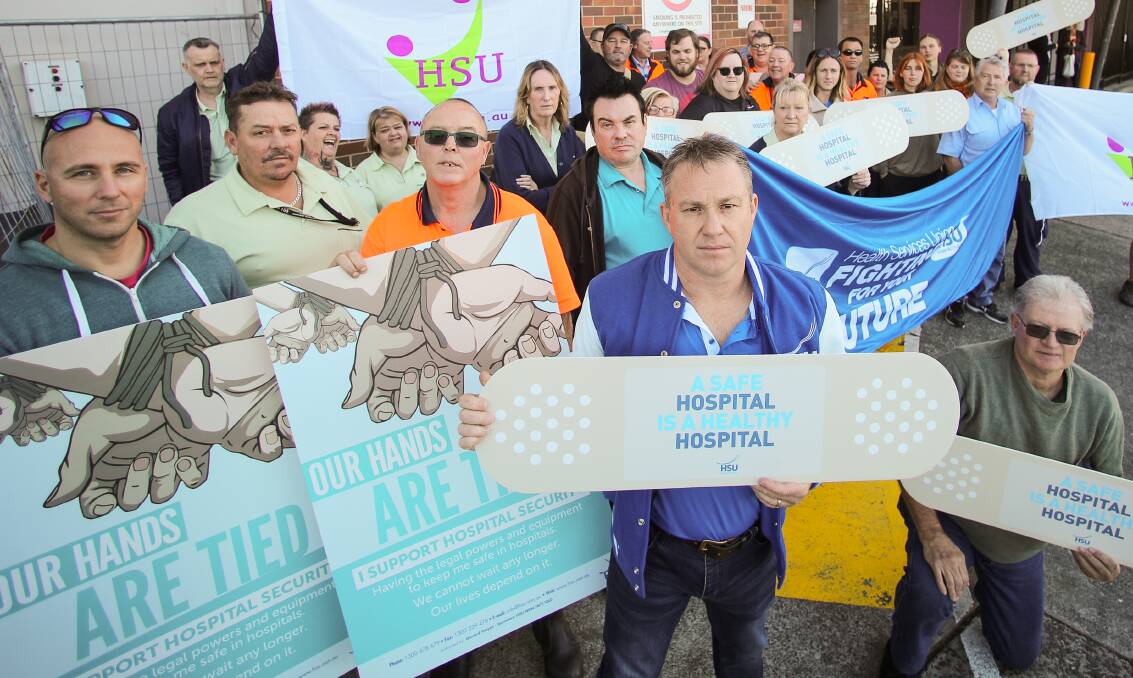 Strike action: Wollongong Hospital HSU members took part in a statewide stoppage in 2019. HSU regional organiser Mark Jay (centre) says more staff are urgently needed. Pictures: Adam McLean