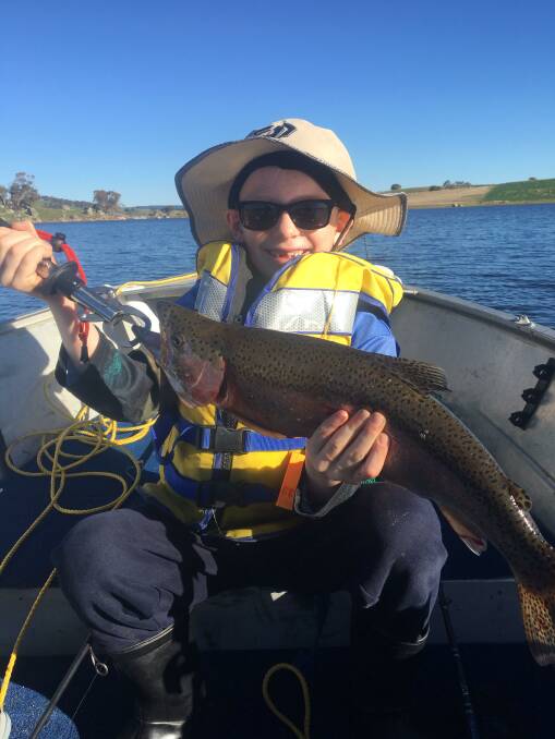 WHAT A CATCH: Seven-year-old Bradley Johnson with a rainbow trout he caught at Oberon Dam over the Easter weekend.