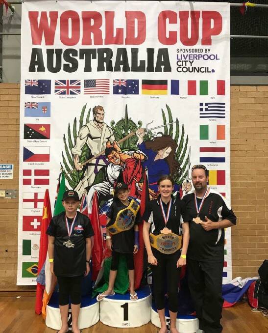 WINNERS: The Gibbons family - Hannah, Tegan, Chloe and Damian - picked up some great results at the Karate World Cup in Liverpool last month.