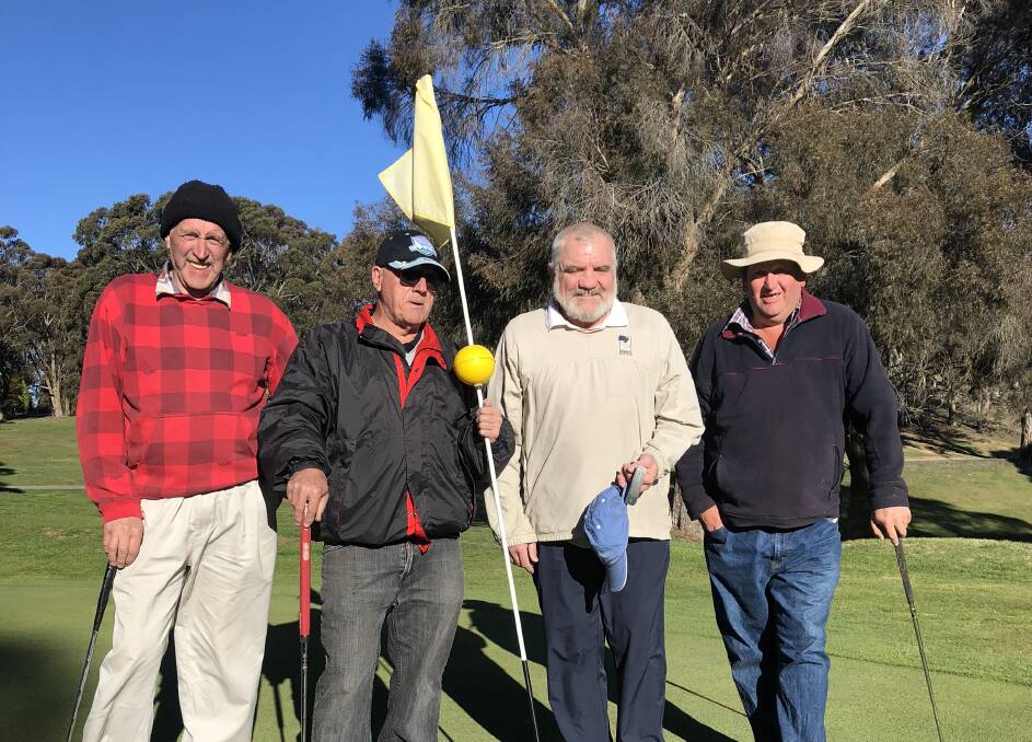 HAPPY GOLFERS: Kevin Whalan, John Crichton, Laurie Murphy and Neil Whalan finishing their game on the 18th. Some Saturday golfers were away on a tour last weekend.