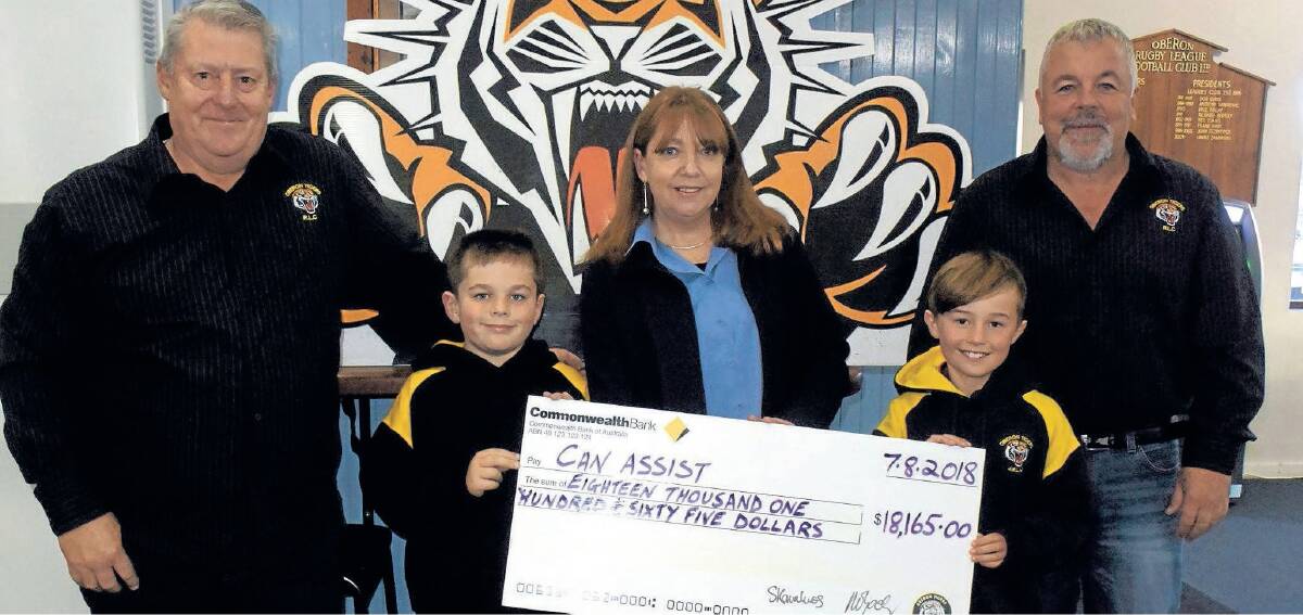 DONATION: Over $18,000 was raised for Can Assist in 2018. Pictured are Oberon Tigers secretary Neil O'Grady, Sam Kavalieros, Oberon Can Assist president Brenda Armstrong, Archie Grahm and juniors president Spiro Kavalieros.