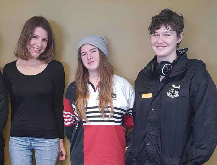 SMILE: Oberon High School students Megan Jacobson, Lisa Keats and Emily Henby at creative writing workshop.