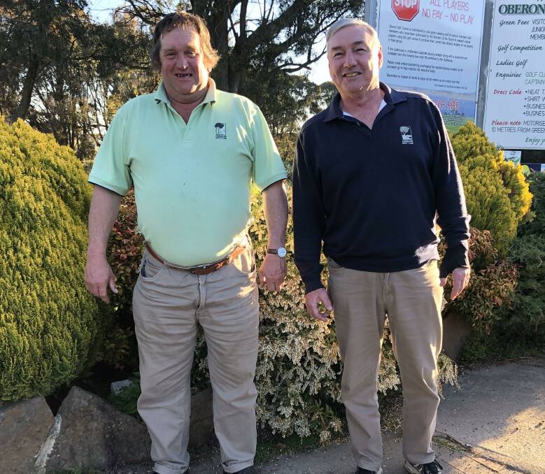 SUCCESS: Men's golf A grade winner Neil Whalan with Adrian Poulten, who scored an eagle on the 15th hole. It's been a busy time on the course.