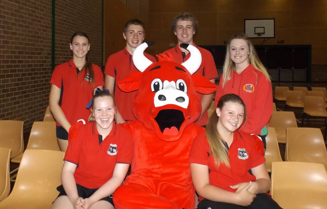 SMILE: Oberon High School students with their new school mascot Benny the Bull. Benny is designed to strengthen school spirit and school expectations.