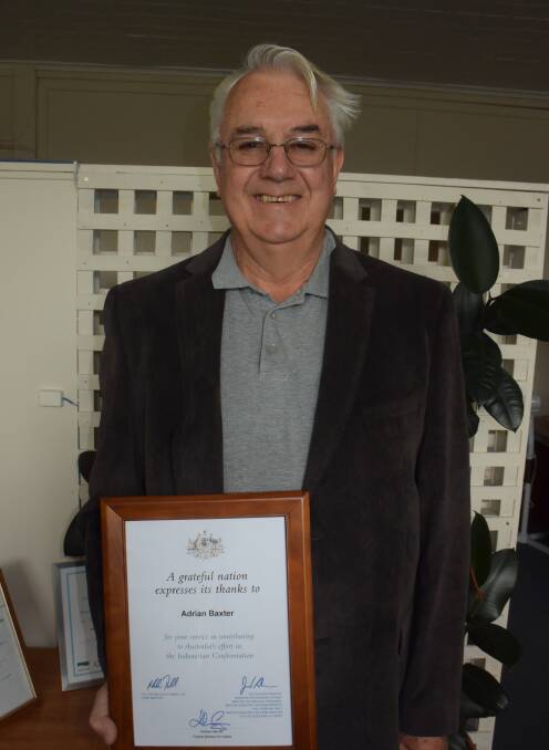 RECOGNISED: Adrian Baxter with his certificate from the Federal Government thanking him for his services in the 18 Light Anti Aircraft Artillery Regiment.