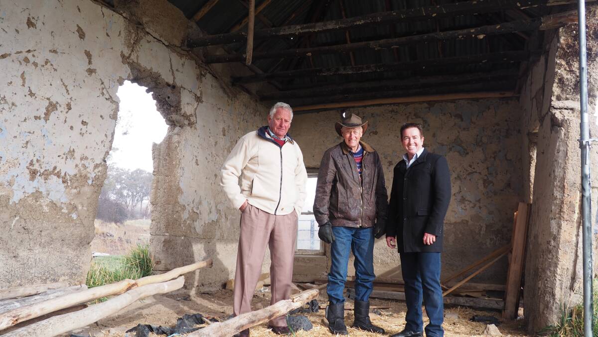 DOWN TO EARTH: Angus McKibbon, O’Connell property owner Gavin Christie and Member for Bathurst Paul Toole in an earth building.