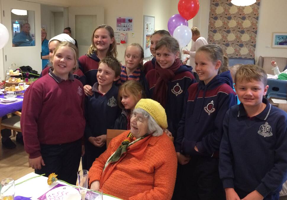 SMILE: Students from St Joseph's School celebrate Mother's Day at Columbia Aged Care facility.