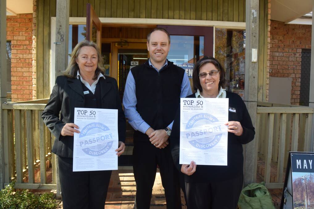EXCITING PROJECT: Deb Marks from the Oberon Visitor Information Centre, Oberon Council's tourism and economic development manager Mathew Webb and Lynn Causer with the Central NSW Discovery Passports.