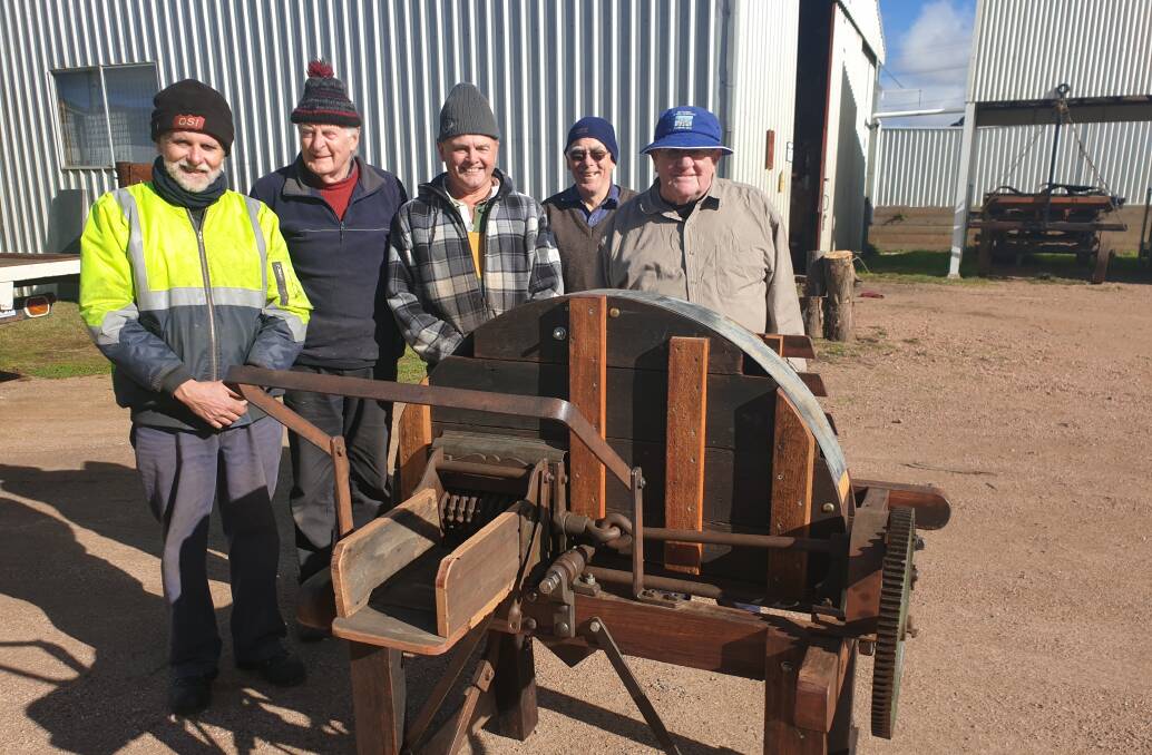 WELCOME: Members of the heritage machinery restoration group, Jim Hawkes, Bob Mills, Phil Harper, Tim Arnison and Terry Boyce, will welcome U3A members to inspect a collection of historic artefacts.