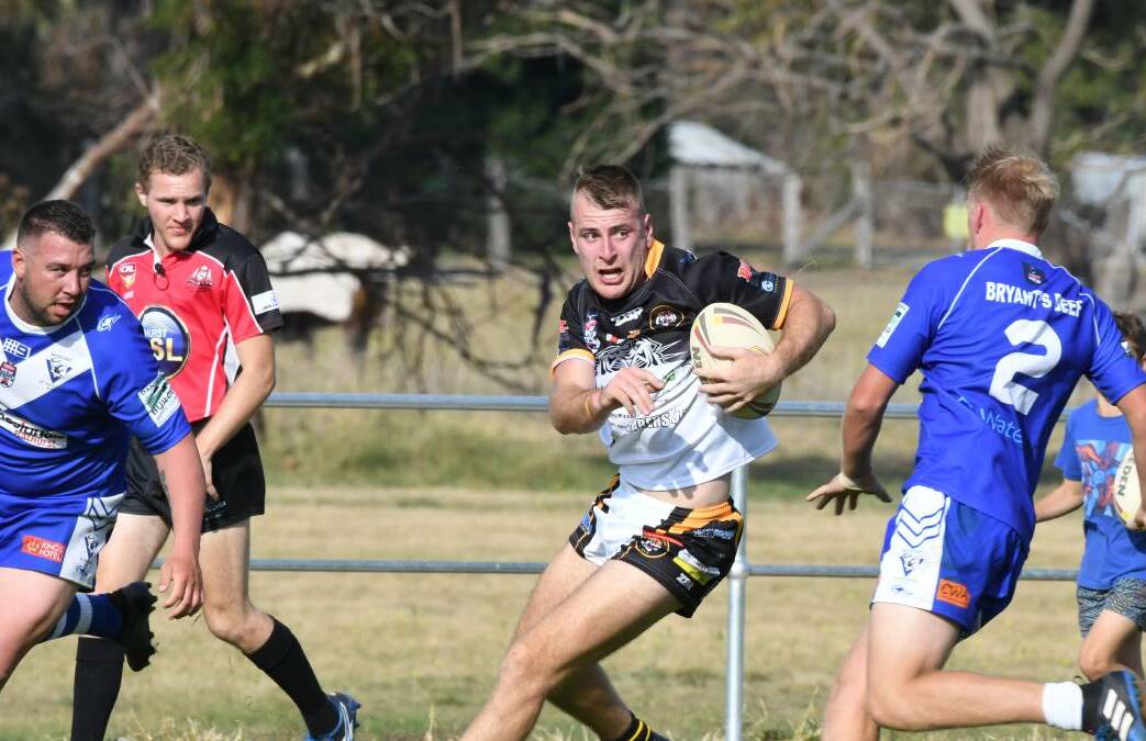 FORWARD: Oberon Tigers fullback Jackson Brien stepping through the St Pat's defence in a hard-fought game on Sunday. Oberon Tigers went down 16-10 at Jack Arrow Oval in Bathurst.