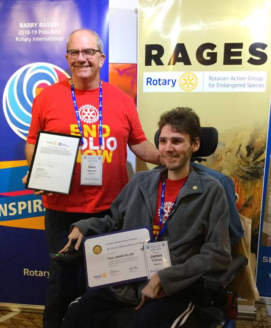 SMILE: Oberon Rotary member Glen Stewart with James Baxter-O’Shea holding his Paul Harris Fellow Award.