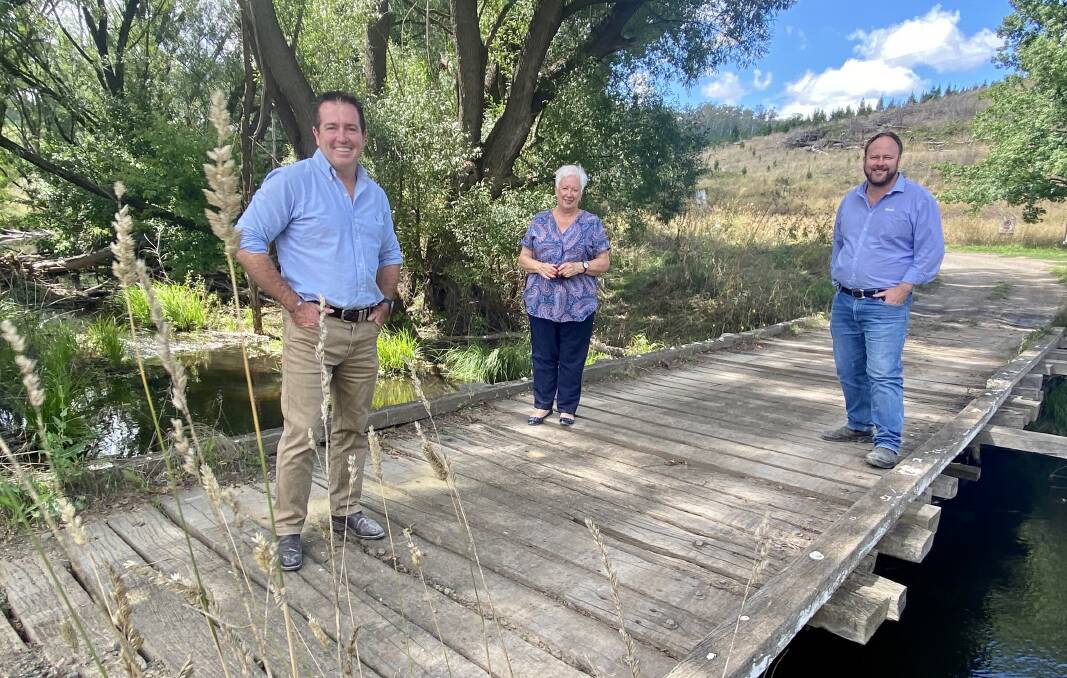 FIXING COUNTRY BRIDGES: Member for Bathurst Paul Toole, left, with Oberon Mayor Kathy Sajowitz and Oberon Council engineer Chris Schumacher at the Swallows Nest Bridge which will be replaced thanks to the NSW Governments Fixing Country Bridges program.