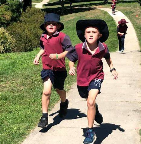 EFFORT: St Joseph's School students Jack Kilby and Billy Karadimas participated in the school's cross country.