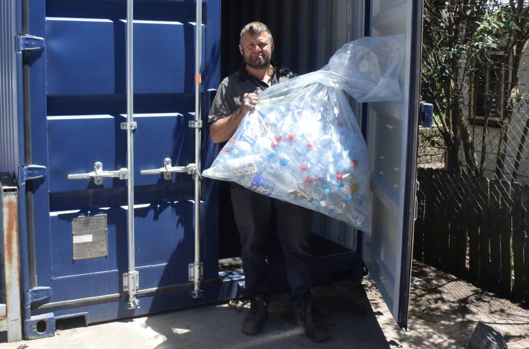 REDUCING LITTER: Alan Stapley from Sargent's Rural Supplies is now the Over the Counter Collection Point for the NSW Government's Return and Earn Container Deposit Scheme.