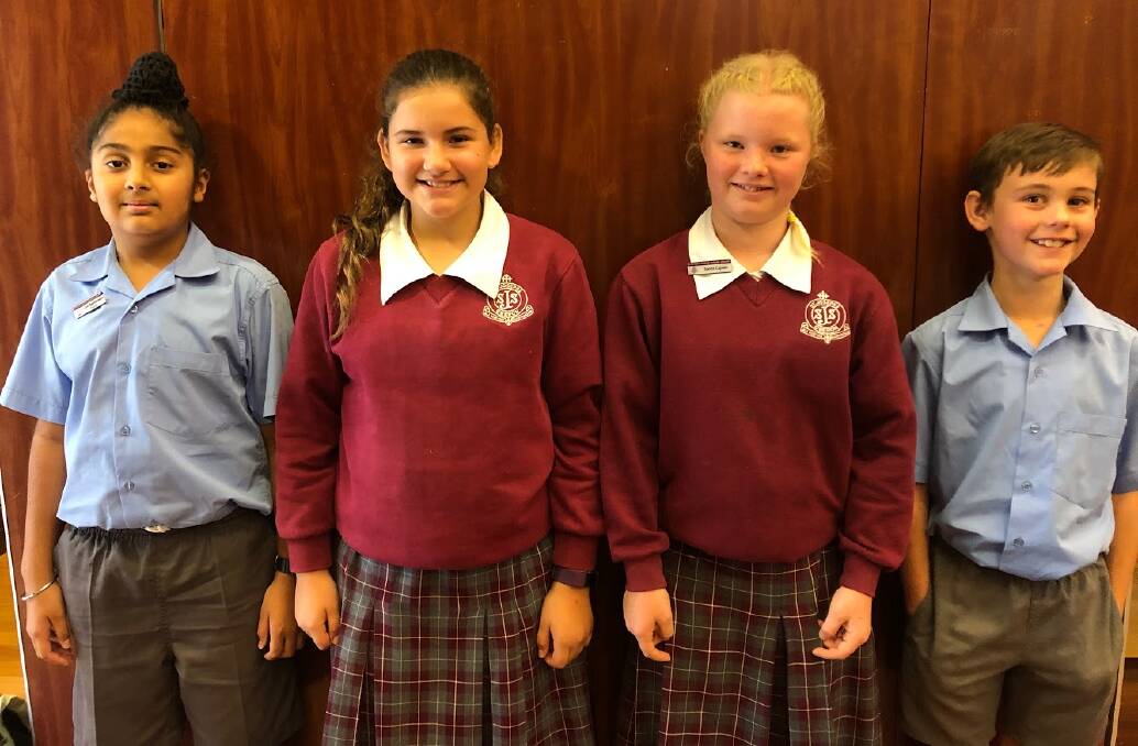 SUCCESS: ST Joseph's School's Keerat Kalkat, Alicia Gaiser, Cady Coyle and Tom Robinson competed in the KidsLit Competition at Kinross Wolaroi in Orange.