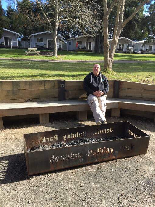 ROOM TO MOVE: New manager Don Kirk relaxing by one of the park's fire pits.