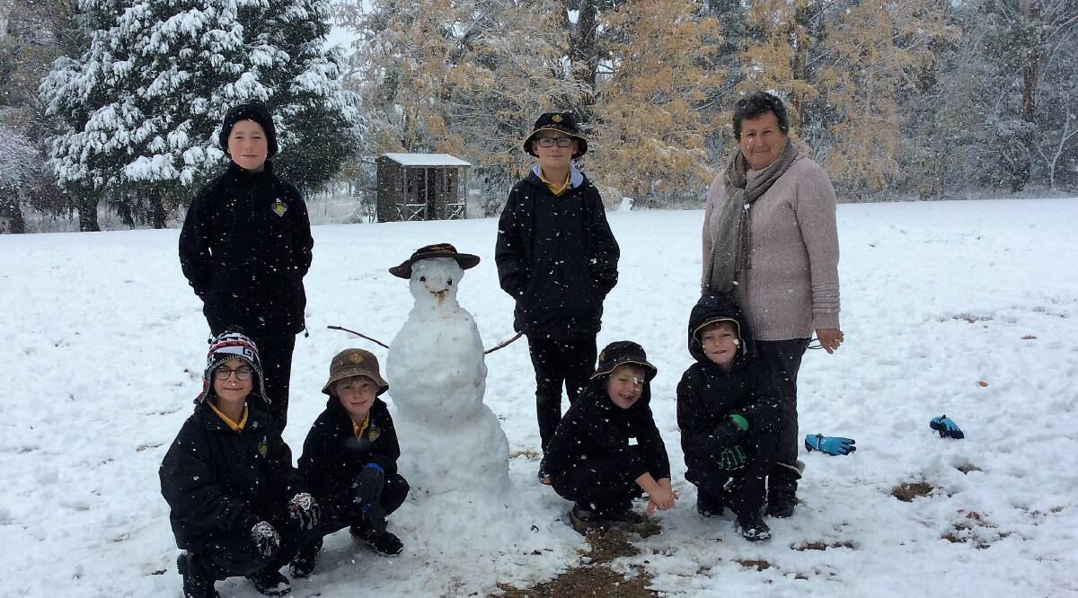 IT'S SNOWING: On Friday, May 11 the students from Black Springs Public School enjoyed a snow day at school. The morning was spent building our first snowman of the year.