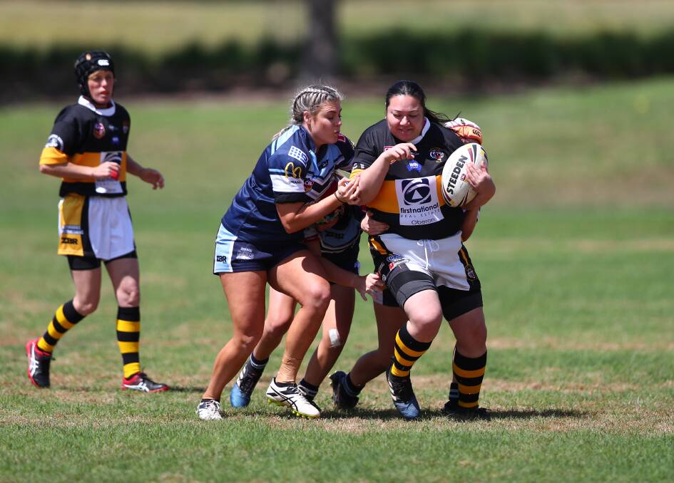ON THE CHARGE: Oberon Tigers league tag player Edwina Ulberg on the attack during the Country Rugby League Women’s Western Nines.