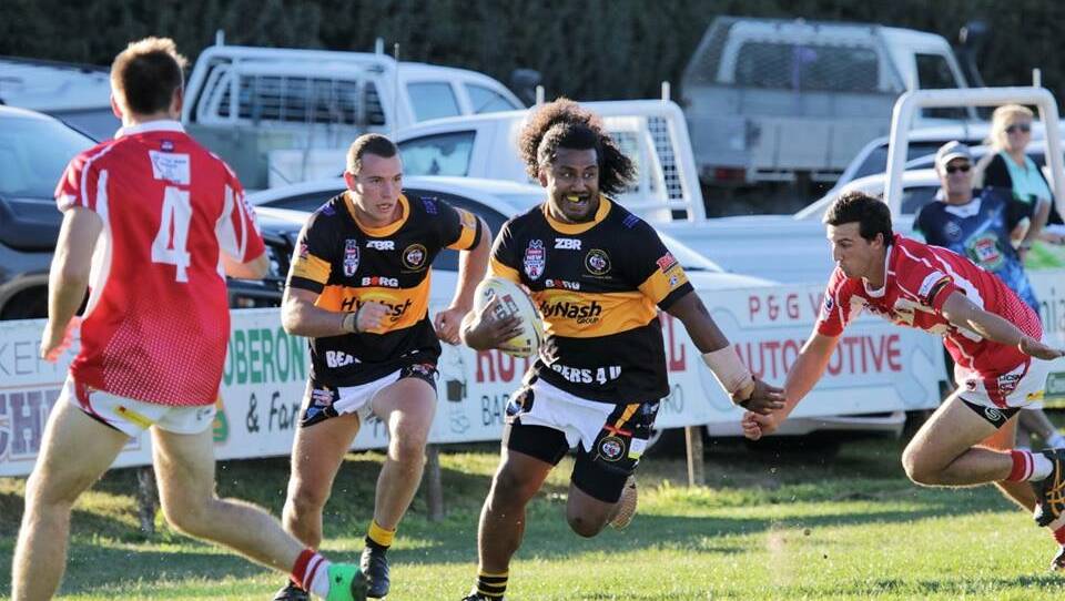 FORWARD: Abel Lefaoseu charges forward in the Oberon Tigers' seesawing win over the Mudgee Dragons on Sunday.