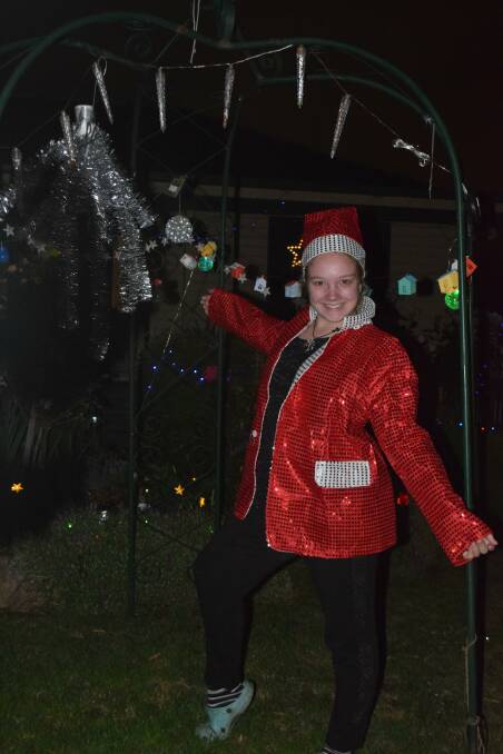 FESTIVE: Brooke Stanton getting the family's Christmas lights display ready at 47 Carrington Avenue. A competition will again be held to find the best lights.