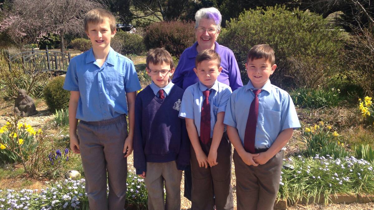 VISIT: On September 21, four St Joseph's School students, Mrs Gallagher and Mrs Pointon visited Brenda Lyon's beautiful garden on World Peace Day.
