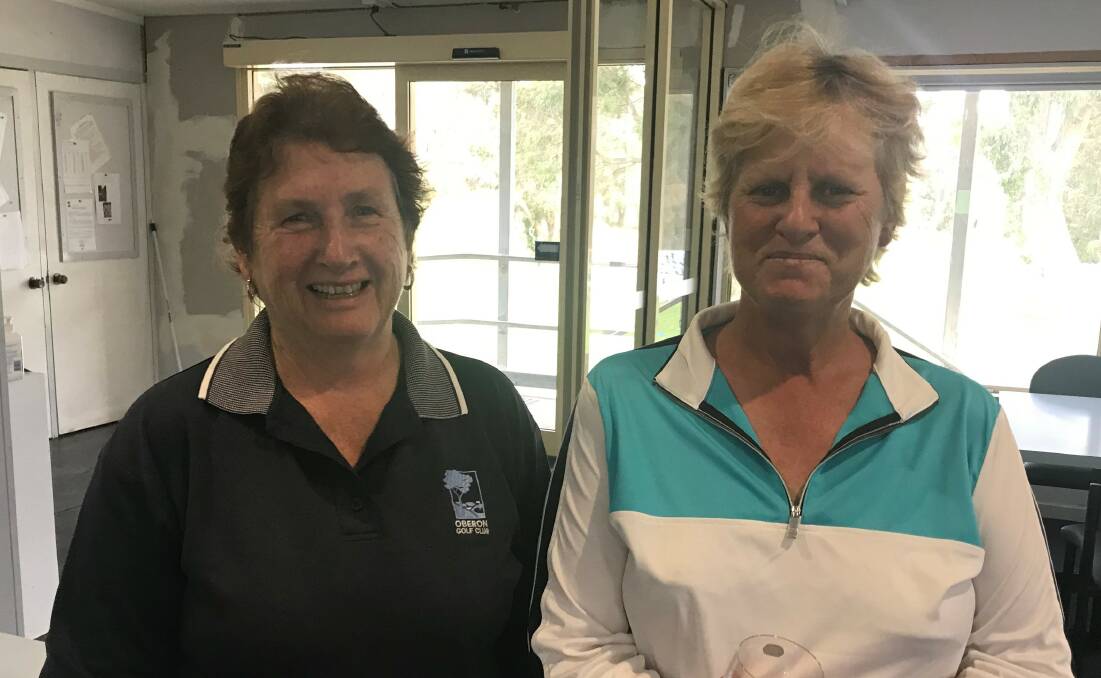 OUT IN FRONT: Women's Golf Club Championships Division 2 leader Glennie McGrath and Division 1 leader Sue Webb.