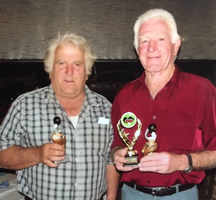 SUCCESS: Burraga indoor bowls winners Armando Giovanetti and Tony Press. A presentation and Christmas dinner was held recently.