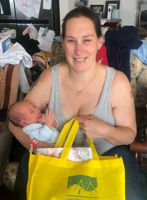 SUPPORT: Heather Crichton and baby William were two of the recipients of a FOOLs Welcome Baby Bag, which contain booties, toiletries and information brochures.