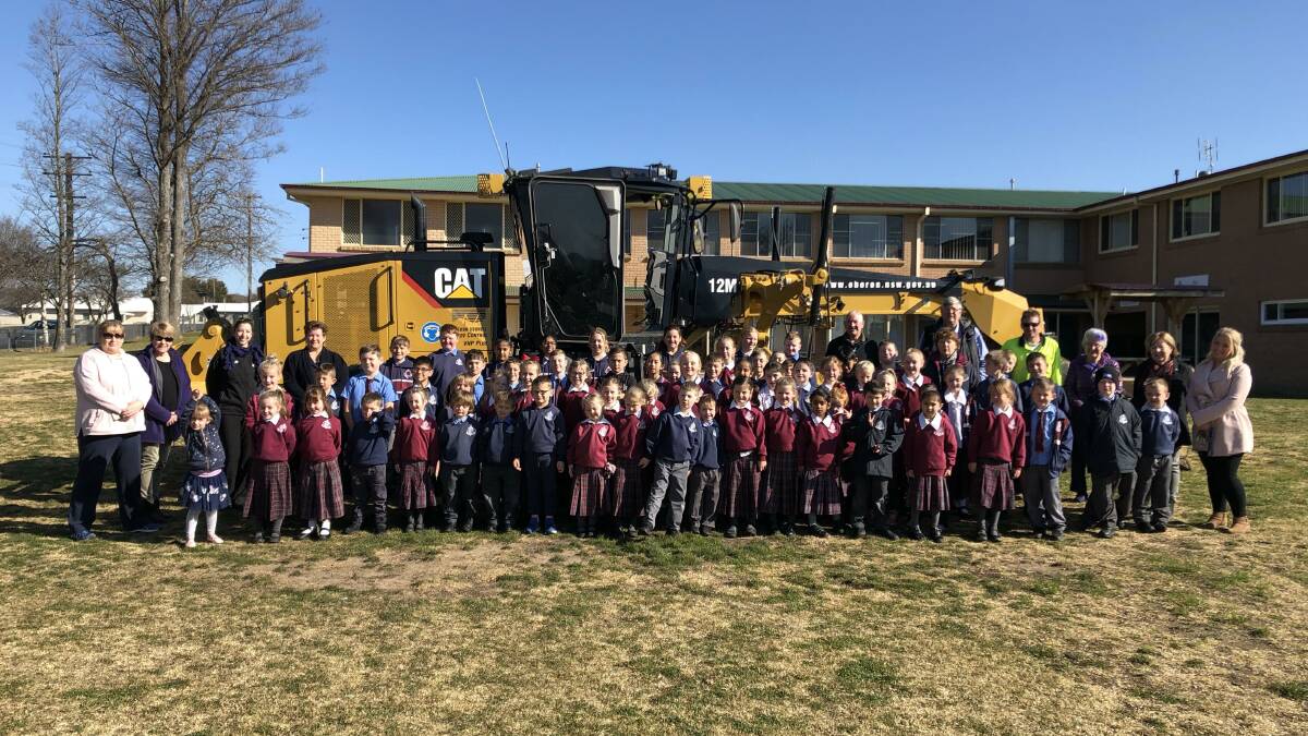 BIG: Oberon councillors and staff were at St Joseph's School with a huge grader as part of Local Government Week.