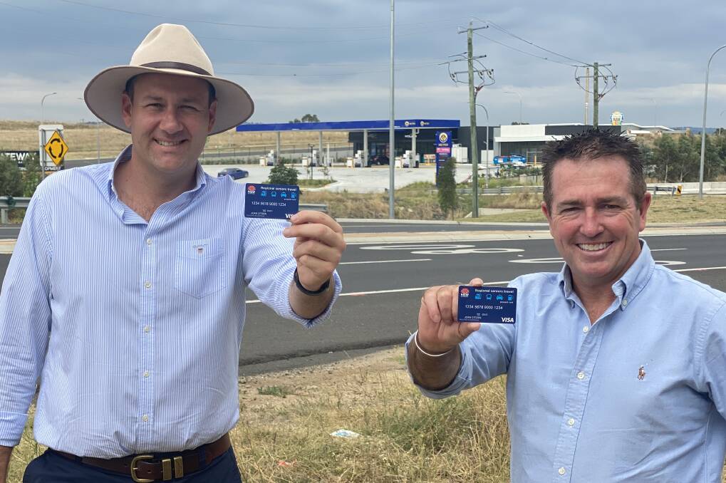 TRAVEL CARD: Bathurst MP Paul Toole, right, with Sam Farraway MLC and the NSW Regional Seniors Travel Card. Photo: SUPPLIED