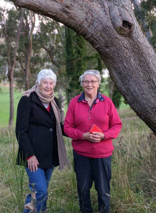GREAT OUTDOORS: Golfers Joan Graham and Marjorie Webb on Oberon Golf Course where the squirrel glider was returned to its own habitat.