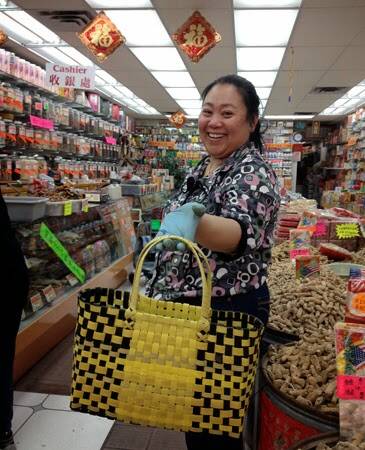 CLEVER: Oberon's Waste to Art competition will be held in May. Pictured is Gay Chan with her shopping bag made from strapping.